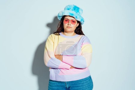Photo for Plus size woman model posing in studio and having fun. Shots taken on white background and direct hard light - Royalty Free Image