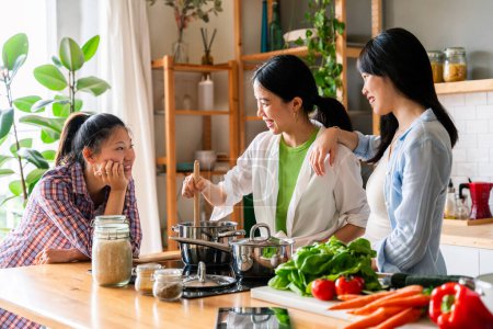 Photo for Happy beautiful chinese women friends bonding at home - Playful pretty asian female adults meeting and having fun at home, concepts about lifestyle, domestic life and friendship - Royalty Free Image