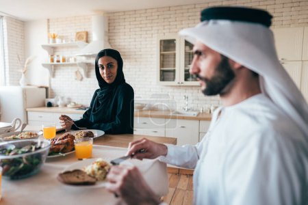 Photo for Traditional arabian family from Dubai spending time together at home. Concept about, emirati culture, parenthood, adoption and  family lifestyle - Royalty Free Image