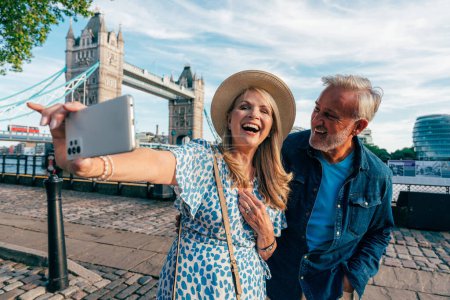 Photo for Happy senior couple spending time together in London city. Concepts about seniority, lifestyle and travel - Royalty Free Image