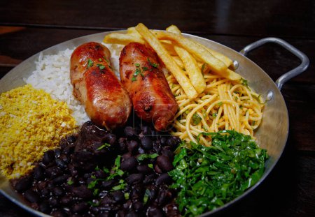 Photo for Traditional brazilian food with sausage and rice. - Royalty Free Image