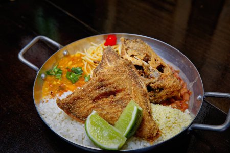 Photo for Brazilian dish fried fish with rice and puree - Royalty Free Image