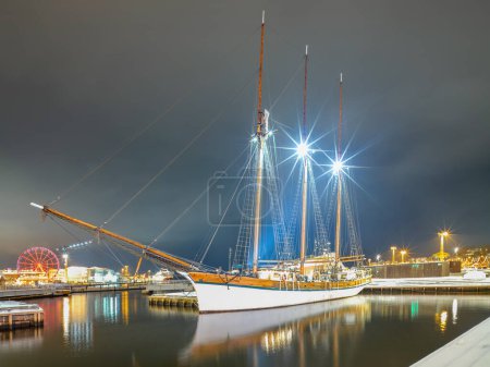 Beautiful three masted sailing ship moored in Helsinki in winter