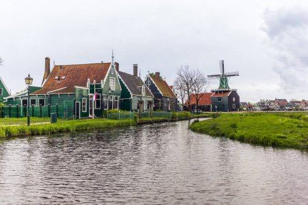 Old houses, wooden boats and farms in the picturesque village of Zaanse Schans in the Netherlands
