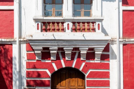 Photo for Panjim, Goa, India - January 2023: Exterior facade of a vintage Portuguese era building in Fontainhas in the Latin Quarter of the city of Panaji. - Royalty Free Image