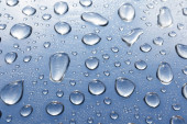 Water drops on steel background Poster #654139556