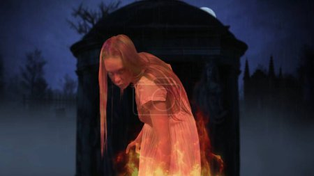 Cimetière incendié. Fantôme se tient au centre du cadre en face d'une énorme pierre tombale noire, pierre tombale. Halloween, saison effrayante. Clip pour votre publicité ou contenu créatif.