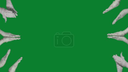 Photo for Detail green screen isolated chroma key photo capturing lots of mummies hands clapping all around the sides of the frame. Mock up, workspace for your promotion clip or advertisement. - Royalty Free Image