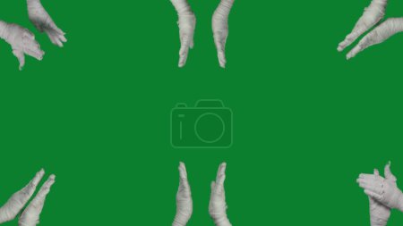 Photo for Detail green screen isolated chroma key photo capturing lots of mummies hands clapping all around the frame. Mock up, workspace for your promotion clip or advertisement. - Royalty Free Image