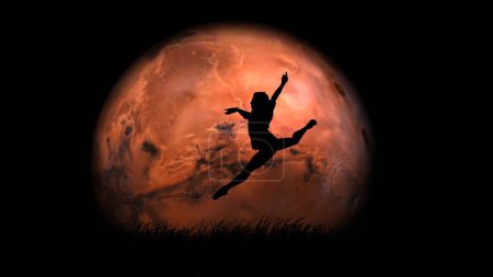 Photo for Ballet on the full moon background art concept. Portrait of beautiful male dancer. Man ballet dancer performing high jump element of classical choreography on red solar planet background. - Royalty Free Image