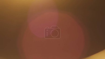 Photo for Cinematic lights reflections. Lens flare flashes effects on black background. Anamorphic lens flares advertisement template creative concept. Abstract overlay with soft pink warm light transition. - Royalty Free Image
