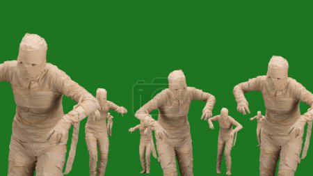 Photo for Green screen isolated chroma key video capturing lots of mummies walking towards the camera with their arms outstretched. Full length. Mock up, workspace for your promotion clip or advertisement. - Royalty Free Image