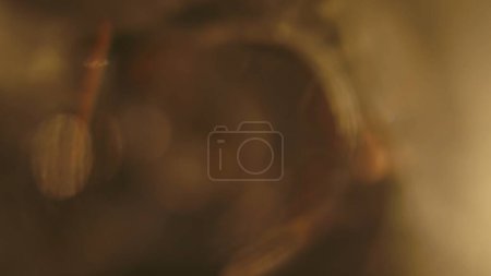 Photo for Abstract golden brown defocused blur bokeh light background - Royalty Free Image
