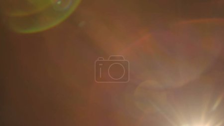 Photo for Real flare lens that is easy to use in blend or overlay modes. The side yellow light shines, creating a colorful reflection of a red and pink halo. Light transition, prism effect, light leakage - Royalty Free Image