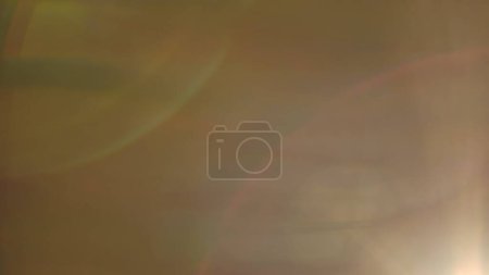 Photo for Real flare lens that is easy to use in blend or overlay modes. The side yellow light shines, creating a colorful reflection of a red and pink halo. Light transition, prism effect, light leakage - Royalty Free Image