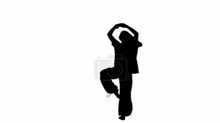 Photo for Modern creative choreography and dance concept. Portrait of female dancer. Attractive girl silhouette turning with leg up, contemporary dance, isolated on white background alpha channel. - Royalty Free Image