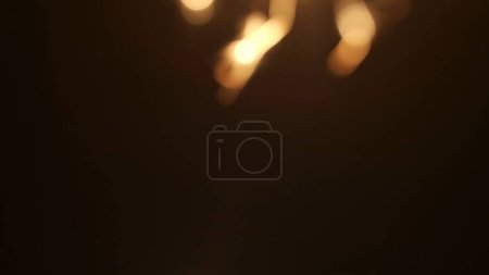 Photo for Frame on black background. Depicted are lights of light, glare, they are in the corner. Demonstrating lighting, smooth transition, gradient. Used for screensaver and background. Macro shot. - Royalty Free Image