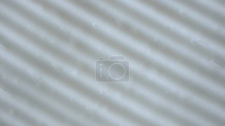 Photo for Beauty and skin care products advertisement creative concept. Close up shot of cream background. Face or body white cream fluid texture with strokes. Smooth moisturizer cream shot - Royalty Free Image
