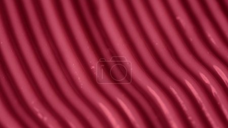 Photo for Cream texture with a pattern of stripes and furrows in red color. Face or body cosmetic product, close up. Creative concept of beauty industry advertisement - Royalty Free Image