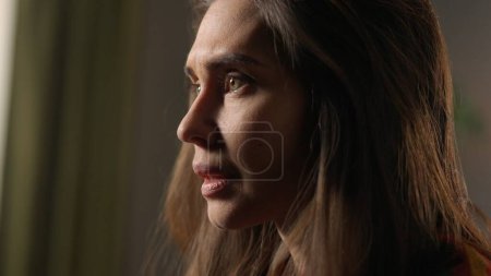 Photo for Human extreme emotions creative advertisement concept. Portrait of attractive female model in negative mood. Close up shot brunette woman face in depressed mood, breathing heavily tears in eyes. - Royalty Free Image