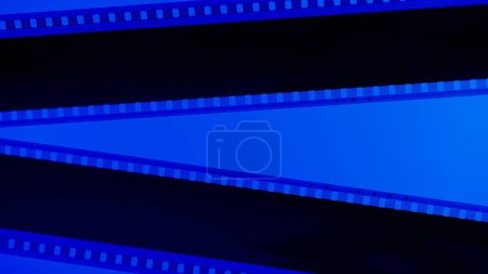 Photo for Two black film strips on blue background close up. 35mm film slide frame. Copy space - Royalty Free Image