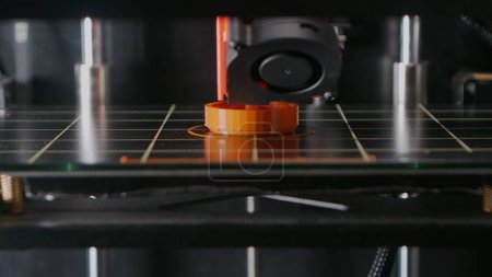 Photo for Future innovative industrial concept. Creativity of a 3D printer printing amazing parts right before your eyes. Watch as each layer of material is brought to life. Close up. Time lapse - Royalty Free Image