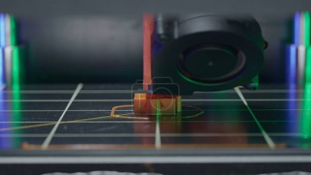 Photo for A 3D printer masterfully brings to life a spare part of your order. The process of printing a part on a 3D printer, close-up. This video is all about how technology turns your ideas into reality - Royalty Free Image