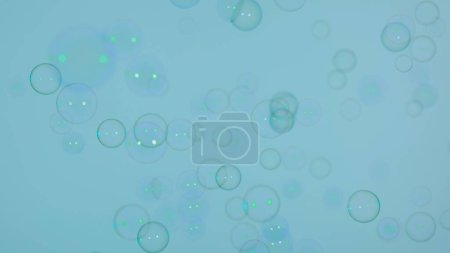 Photo for Soap bubbles on a blue background. - Royalty Free Image