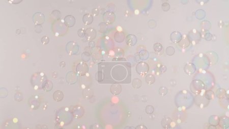 Photo for Soap bubbles on a pink background. - Royalty Free Image