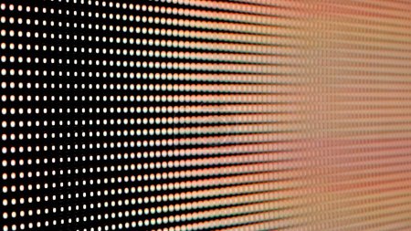 Photo for This image showcases a close up view of a bright LED light panel with a grid of illuminated pixels, creating a modern and technological texture. - Royalty Free Image