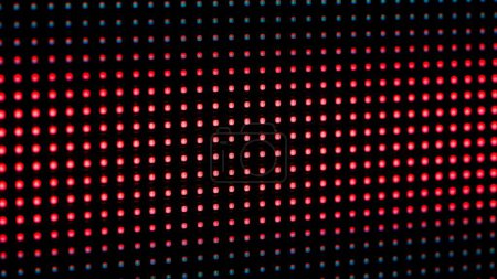 Macro shot of the bright RGB dots of a digital LED screen. The image demonstrates screen flickering, streaking, and epileptic glitches.