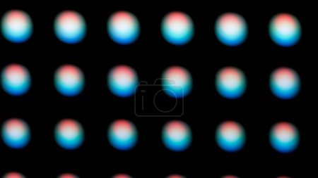 Foto de Una macro toma de un panel led digital. La imagen resalta los píxeles RGB individuales dispuestos en una cuadrícula. Parpadeo de pantalla y fallos epilépticos. - Imagen libre de derechos