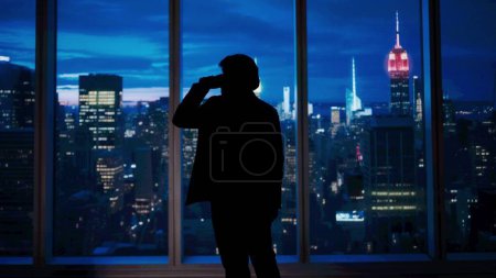 Photo for Corporate business advertisement concept. Successful business man in the office. Man ceo hedge fund top manager drinking coffee from mug in front of window with evening city view. - Royalty Free Image