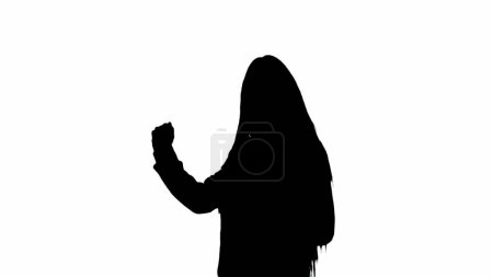 Photo for Tv news report and live broadcasting advertisement concept. Female reporter black silhouette on white background with alpha channel. African American woman news host with tablet talking shows empty - Royalty Free Image