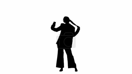 Photo for Modern businesswoman creative advertisement concept. Business woman in formal outfit holding smartphone and taking selfie pictures. Black silhouette on a white isolated background. - Royalty Free Image