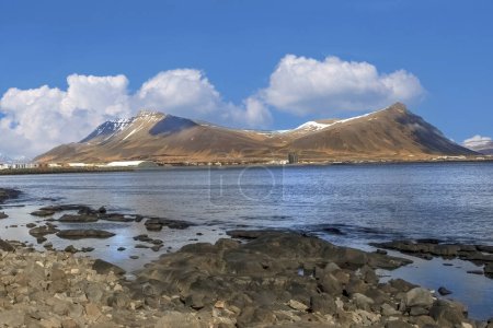 The volcanic mountain Akrafjall seen from the coast of the town of Akranes.