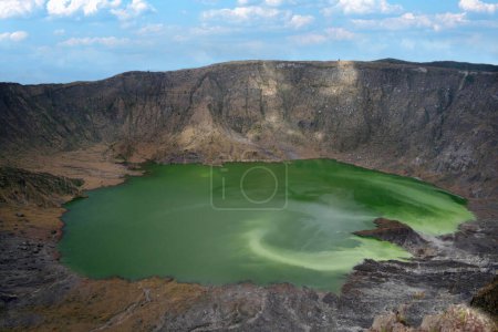The crater of the El Chichon volcano or El Chichonal and its green lake of sulphuric acid. Mexico