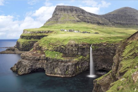 Mulafossur waterfall on the island of Vagar, Faroe Islands, Denmark, Europe