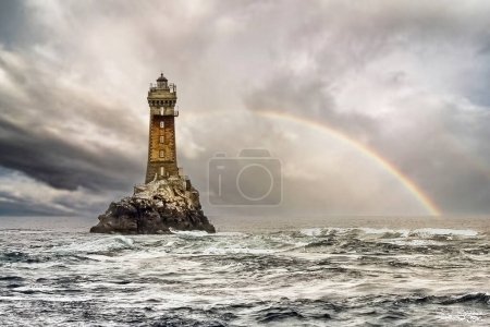 La Vieille lighthouse in a storm. La Vieille is a lighthouse located in the Finistere department, in the commune of Plogoff, on the north-west coast of France. It stands on the Gorlebella rock, guiding navigators through the Raz de Sein strait.