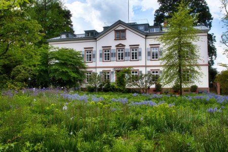 White building in the Hermannshof Gardens in Weinheim, Germany.