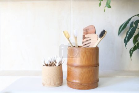 Eco friendly bamboo toothbrush and hair comb and cotton swabs