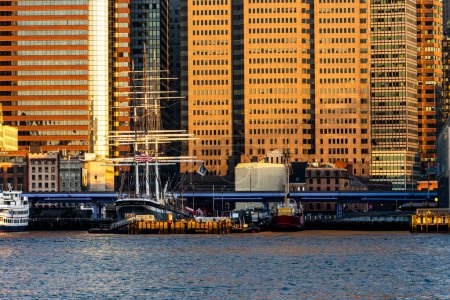 Photo for Brooklyn, NY - USA - March 26, 2023 Horizontal view of the permanently-moored 1885 tall ship Wavertree, at Pier 16 on the East River at sunrise. - Royalty Free Image