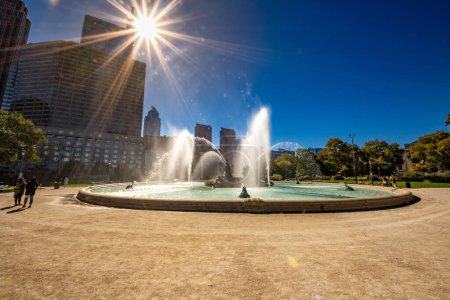 Photo for Philadelphia, PA - US - Oct 13, 2023 Wide angle view of Logan Square, a traffic circle center with a large fountain with whimsical statuary and garden areas with benches. - Royalty Free Image