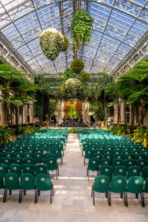 Photo for Kennett Square, PA  US  Oct 14, 2023 Vertical view of the Exhibition Hall at the Conservatory of Longwood Gardens, a botanical garden in the Brandywine Creek Valley in Pennsylvania - Royalty Free Image