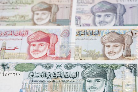 Old Omani money - rial a business background