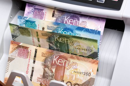Kenyan money - shilling in a counting machine
