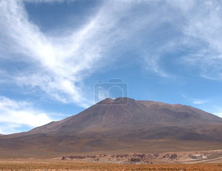 Photo for Vista of trails, wonderous landscapes, skies and mountains across the Altiplano in the high Andes of southwestern Bolivia - Royalty Free Image