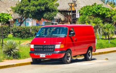 Photo for Various minibuses vans transporters vehicles cars in Puerto Escondido Zicatela Oaxaca Mexico. - Royalty Free Image