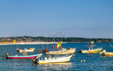 Photo for Boat yacht ship pier and harbor at the tropical mexican beach panorama view in Puerto Escondido zicatela Oaxaca Mexico. - Royalty Free Image