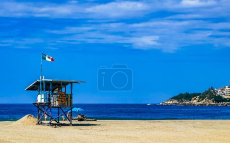Photo for Beach watchtower with Mexican flag in Zicatela Puerto Escondido Oaxaca Mexico. - Royalty Free Image